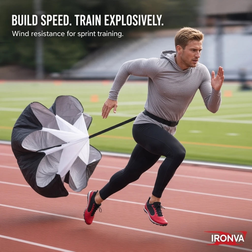 Athlete sprinting on a track while pulling an IRONVA speed training parachute